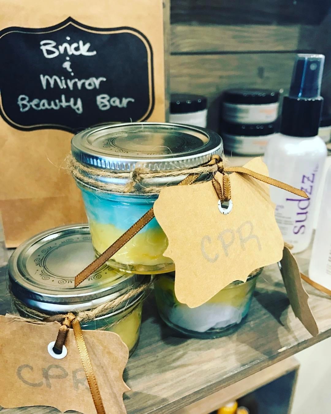 Another genius marketing idea from the crew at Brick and Mirror Beauty Bar! Our C.P.R. Treatment Shots have become SO popular there, that clients have been clamoring for an “emergency shot” for at home use! The team got creative, grabbed some mini mason jars, twine and paper and started reselling the treatment!